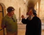 Our guide and friend Fatih in deep conversation with the head monk